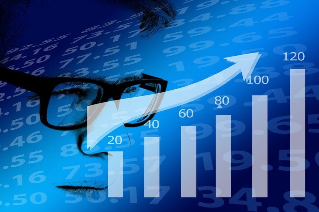 a man's face with glasses and investing graph